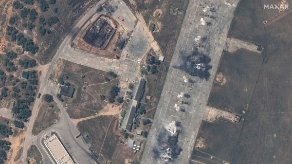 Exclusive satellite images show destroyed Russian jets and building at Crimean airbase