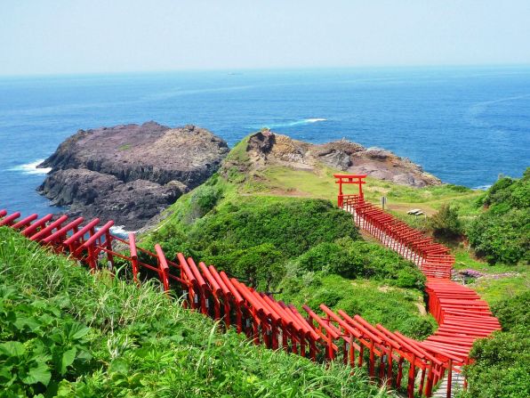 Motonosumi-inari Shrine (Yamaguchi): The 123 Torii gates stretches from the Motonosumi-Inari Shrine to the cliff overlooking the ocean. Motonosumi-Inari is a popular shrine where locals wish for success. The final Torii's donation box is placed out of reach at the top of the gate. It's believed that if you can successfully toss money into the box, all your wishes will come true.